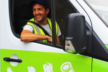 FareShare volunteer driver Rory in a FareShare van delivering surplus food to people in need in London
