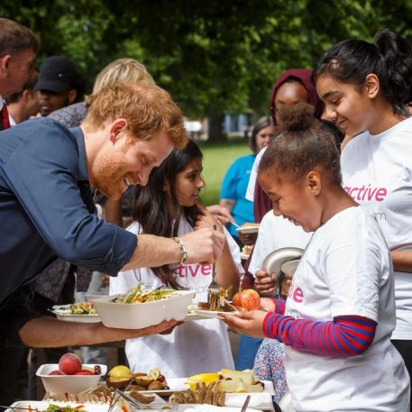 HRH Prince Harry serving lunch at the Newham StreetGames