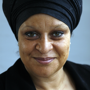 Headshot of Karin Woodley smiling at camera