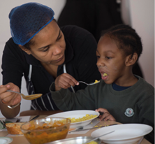 Dow0079980  Fareshare London Telegraph Christmas Charity Pic Shows Children enjoying their meals at Ann Bernadt Nursery in Peckham