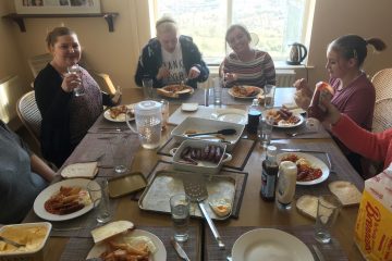 Quaker Cottage service users enjoy lunch for St Patrick's Day