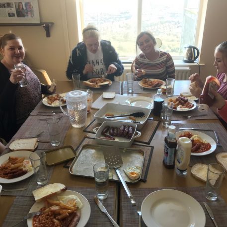 Quaker Cottage service users enjoy lunch for St Patrick's Day
