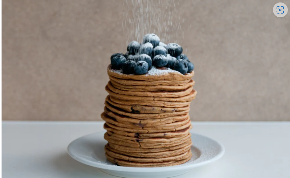 Stack of Huel protein pancakes with blueberries