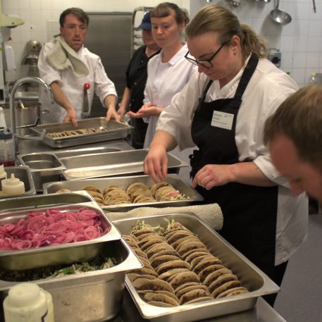Volunteers at the FareShare’s community kitchen in the Midlands prepare tacos from surplus food, which would otherwise go to waste.
